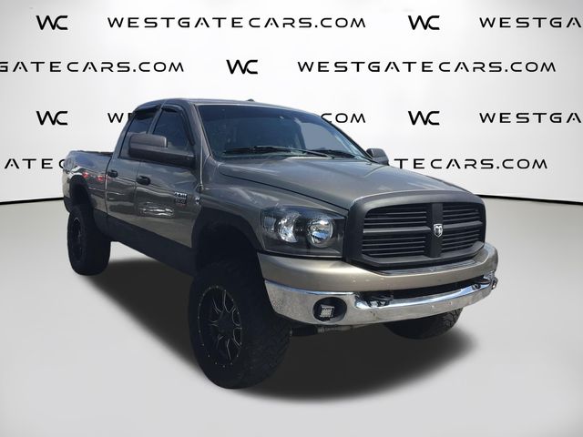 Brown (Light Khaki Metallic Clearcoat) 2009 Dodge RAM 2500 SLT Quad Cab 4WD Pickup Truck Four-Wheel Drive 6-Speed Manual