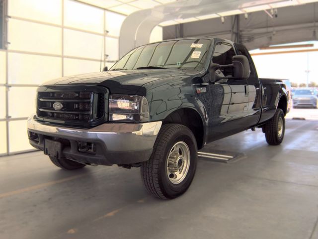 Dark Hunter Green Clearcoat Metallic 1999 Ford F-250 Super Duty Pickup Truck Four-Wheel Drive 6-Speed Manual Overdrive