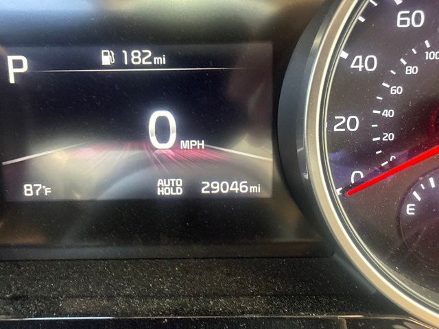 2024 Ceramic Silver Kia Carnival EX FWD Van