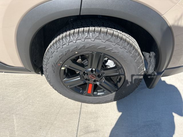 2025 Baja Storm Metallic Nissan Rogue Rock Creek AWD SUV