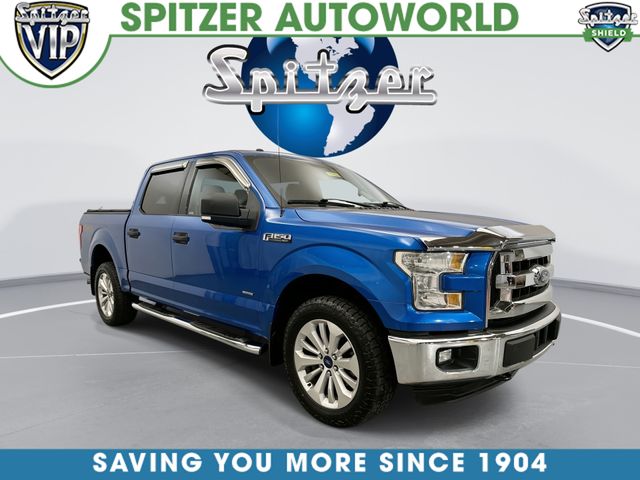 Blue 2015 Ford F-150 Pickup Truck Four-Wheel Drive
