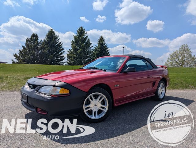Laser Red Tinted Clearcoat Metallic 1998 Ford Mustang GT Convertible RWD Convertible Rear-Wheel Drive 5-Speed Manual