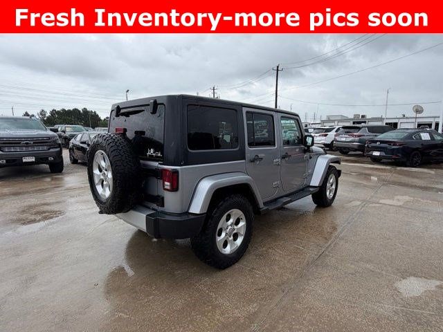 2013 Jeep Wrangler Unlimited Sahara Silver at DeMontrond Auto Country