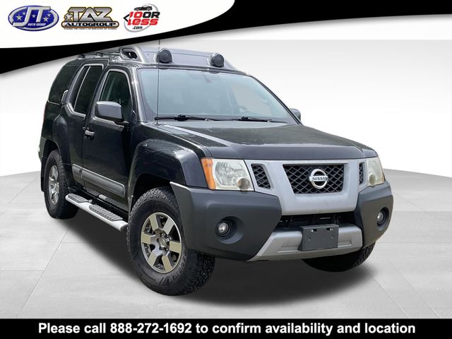 Super Black Metallic 2011 Nissan Xterra SUV / Crossover  5-Speed Automatic