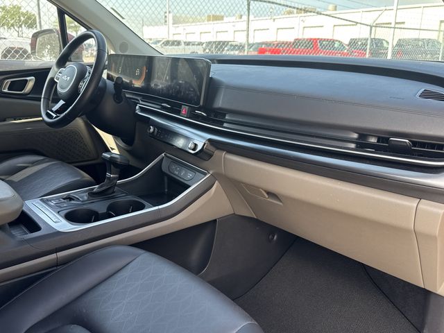 2025 Kia Carnival LXS Red at Bayshore Chrysler Jeep Dodge Ram