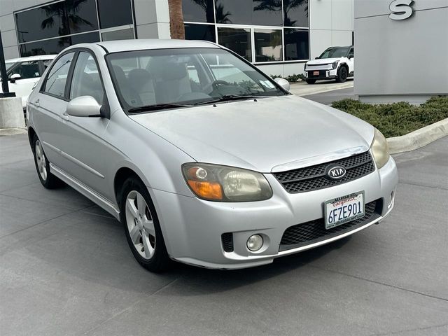 Bright Silver 2009 Kia Spectra Sedan Front-Wheel Drive 4-Speed Automatic Overdrive