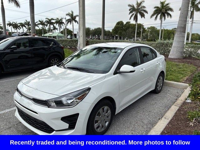 Clear White 2023 Kia Rio Sedan Front-Wheel Drive Continuously Variable Transmission