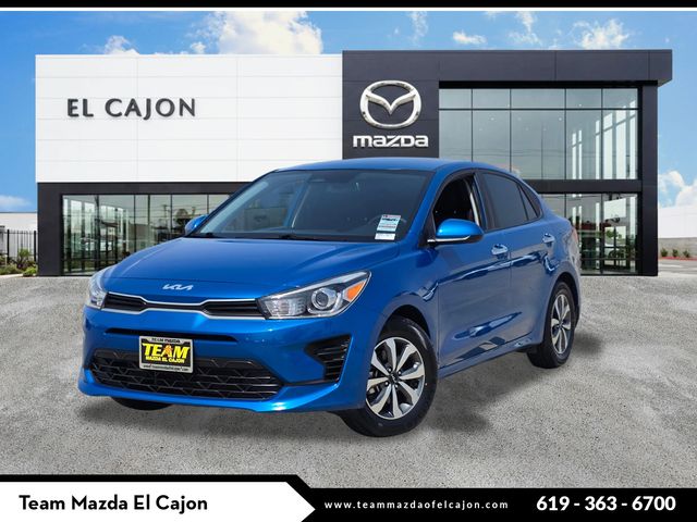 Sporty Blue 2023 Kia Rio S FWD Sedan Front-Wheel Drive Continuously Variable Transmission