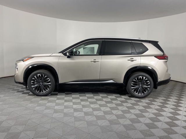 2025 Champagne Silver Metallic/Super Black Nissan Rogue Platinum FWD SUV