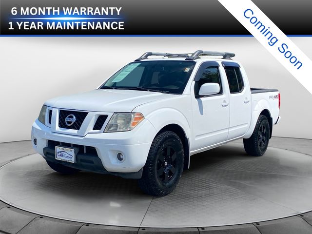 White (Fresh Powder) 2012 Nissan Frontier Pickup Truck Four-Wheel Drive 5-Speed Automatic Overdrive
