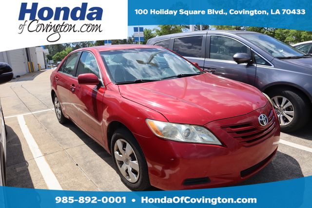 Red 2009 Toyota Camry LE Sedan Front-Wheel Drive 5-Speed Automatic Overdrive