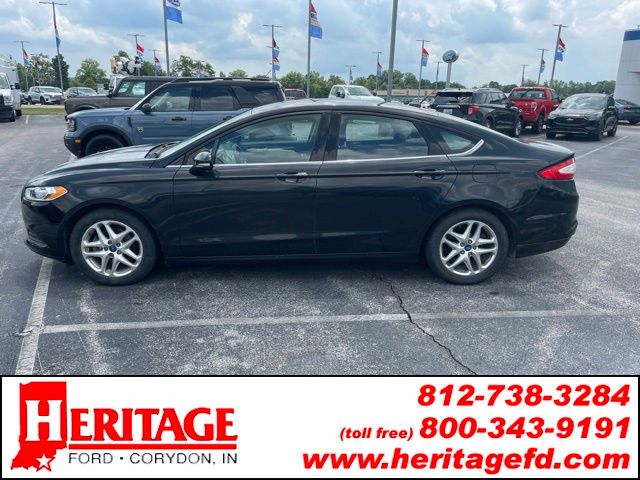 Tuxedo Black Metallic 2013 Ford Fusion Sedan Front-Wheel Drive 6-Speed Automatic