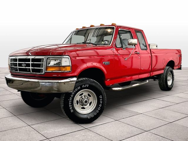 Red 1997 Ford F-250 Pickup Truck Four-Wheel Drive Automatic