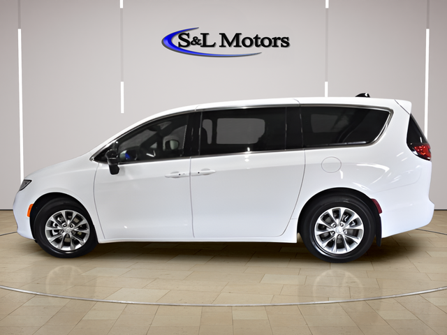 View vehicle photo 3