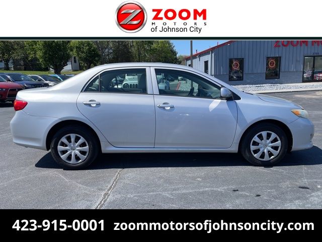 Silver 2009 Toyota Corolla LE Sedan Front-Wheel Drive 4-Speed Automatic