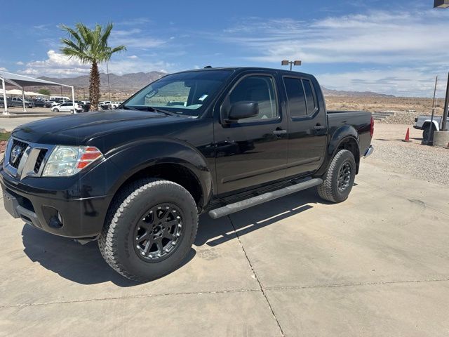 Super Black 2014 Nissan Frontier SV Crew Cab 4WD Pickup Truck Four-Wheel Drive 5-Speed Automatic Overdrive