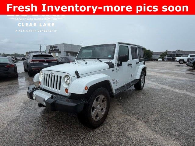 2011 Jeep Wrangler Unlimited Sahara White at Bayshore Chrysler Jeep Dodge Ram