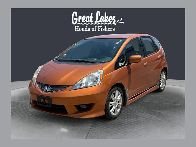 Orange Revolution Metallic 2011 Honda Fit Hatchback Front-Wheel Drive 5-Speed Automatic