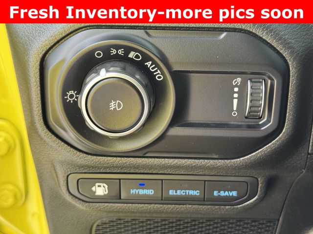 2023 Jeep Wrangler Sahara 4xe Yellow at DeMontrond Gulf Freeway