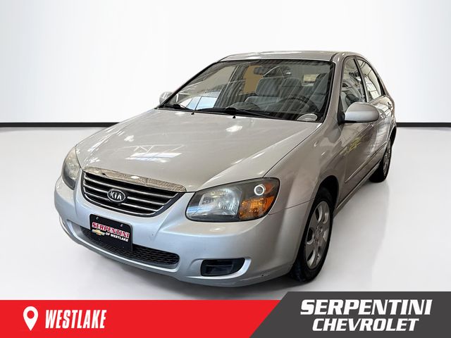 Bright Silver 2009 Kia Spectra LX Sedan Front-Wheel Drive 4-Speed Automatic Overdrive