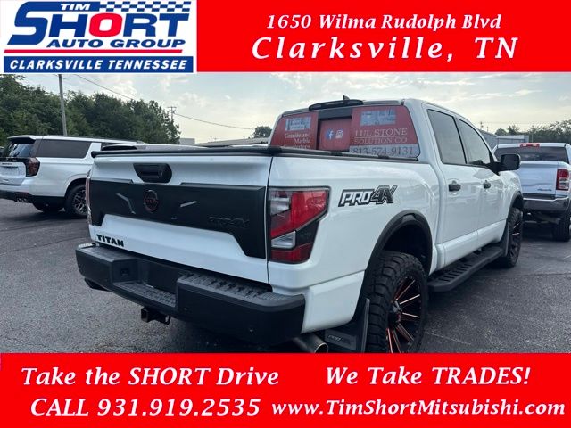 Glacier White 2023 Nissan Titan Pickup Truck Four-Wheel Drive 9-Speed Automatic