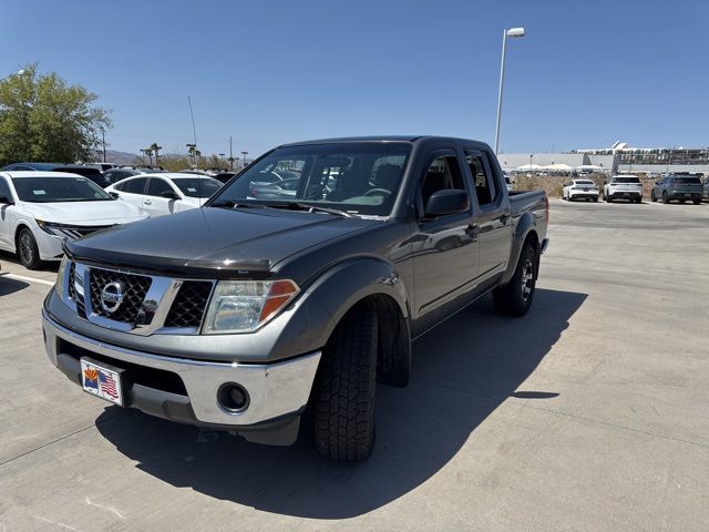 Gray (Storm Grey Clearcoat Metallic) 2007 Nissan Frontier SE Crew Cab 4WD Pickup Truck Four-Wheel Drive 5-Speed Automatic Overdrive