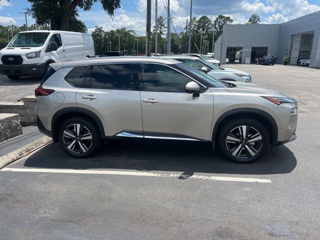 2023 Champagne Silver Metallic Nissan Rogue Platinum FWD SUV