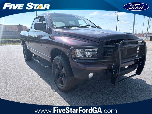 Red (Maroon) 2004 Dodge RAM 1500 Pickup Truck Four-Wheel Drive 5-Speed Automatic