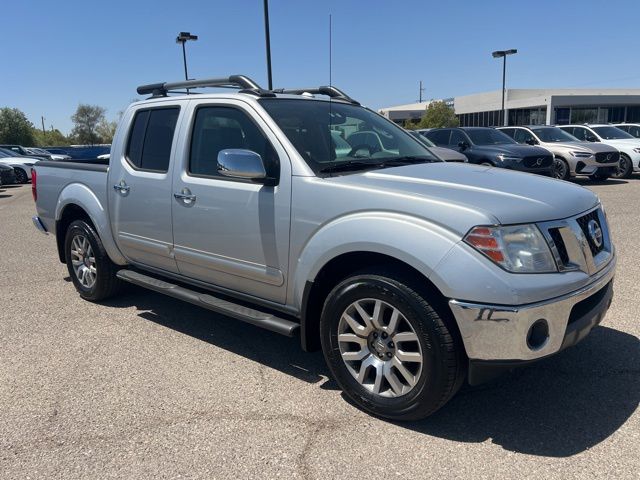 Silver Lightning Metallic 2011 Nissan Frontier SL Crew Cab 4WD Pickup Truck Four-Wheel Drive 5-Speed Automatic Overdrive