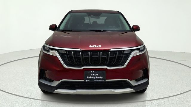 2024 Kia Carnival LX Red at DeMontrond Automotive Group