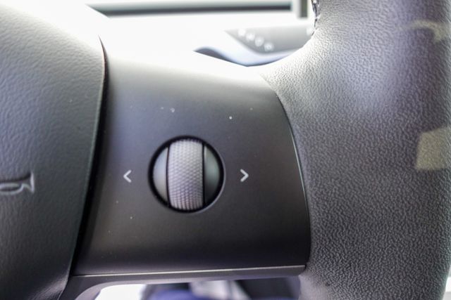 used 2025 Tesla Model Y car, priced at $36,522