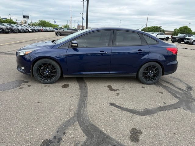 2016 Blue Ford Focus SE FWD Sedan
