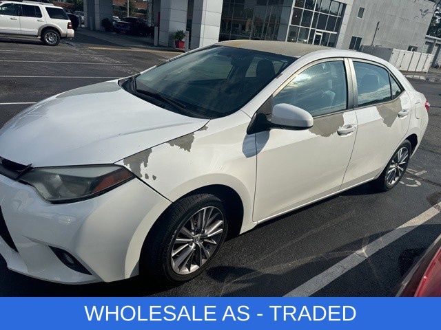 2014 Super White Toyota Corolla LE Sedan