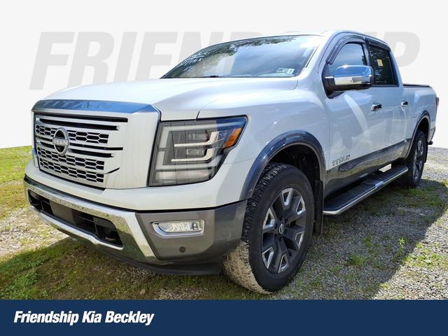 Pearl White Metallic 2023 Nissan Titan Platinum Reserve Crew Cab 4WD Pickup Truck Four-Wheel Drive 9-Speed Automatic
