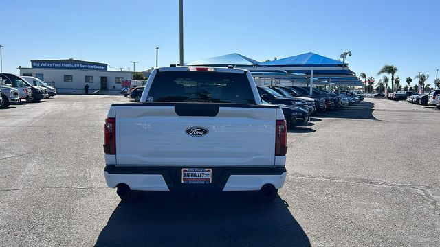 View vehicle photo 4