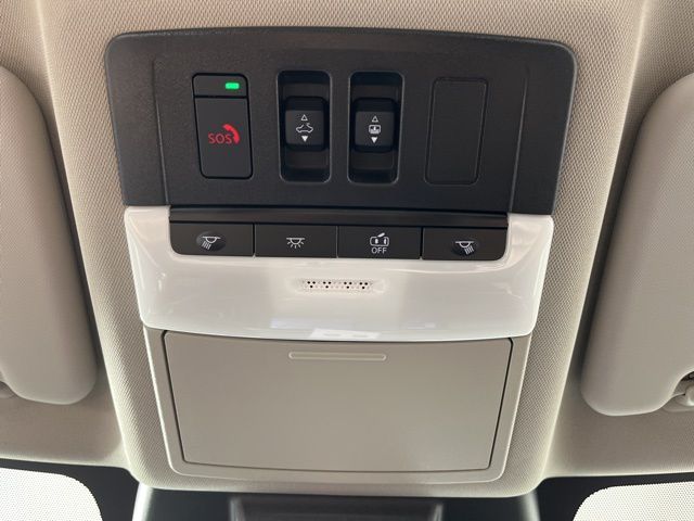2025 Champagne Silver Metallic/Super Black Nissan Rogue Platinum FWD SUV