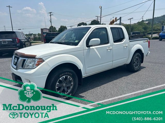 Glacier White 2016 Nissan Frontier Pickup Truck Four-Wheel Drive 5-Speed Automatic Overdrive