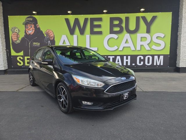 Tuxedo Black 2015 Ford Focus Hatchback Front-Wheel Drive 6-Speed Automatic