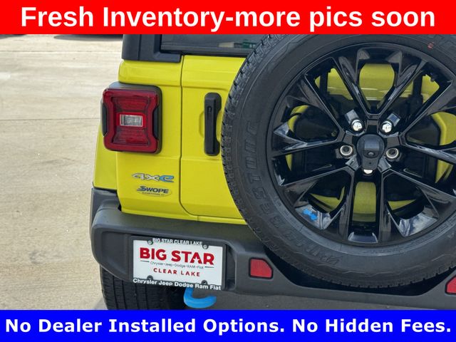 2023 Jeep Wrangler Sahara 4xe Yellow at DeMontrond Gulf Freeway