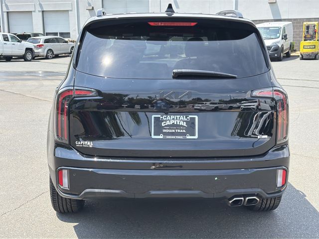 Used 2025 Black Kia EX X-Line image 12