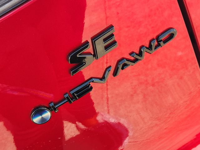 2026 Toyota Corolla Cross Hybrid SE Red at Classic Toyota Galveston