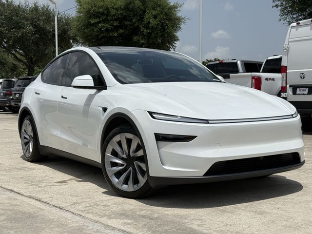 2026 Tesla Model Y Long Range White at AutoSavvy Houston Northwest