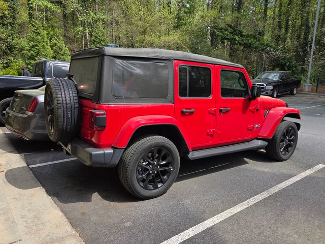 Used 2021 Red Jeep Unlimited Sahara 4xe image 4