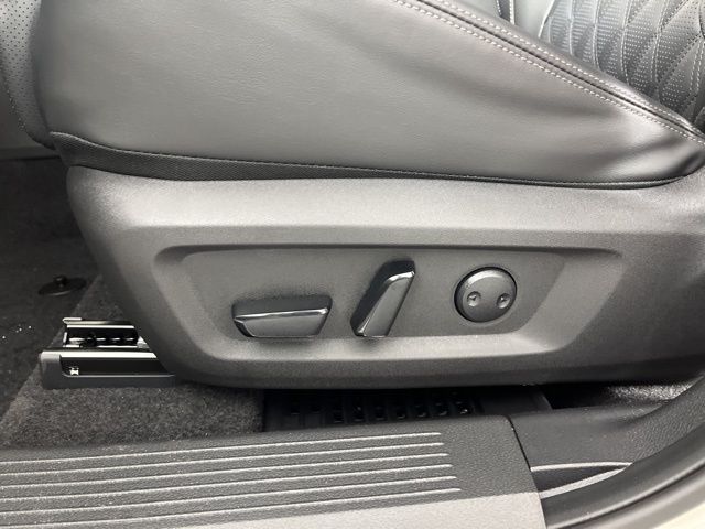 2025 Champagne Silver Metallic/Super Black Nissan Rogue Platinum FWD SUV