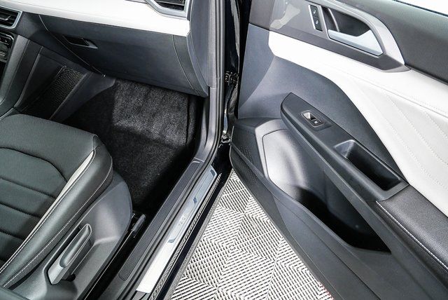 used 2025 Volkswagen Taos car, priced at $27,895