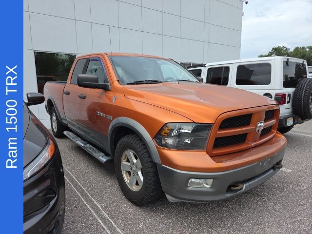 Orange (Mango Tango Pearlcoat/Mineral Gray Metallic CC) 2010 Dodge RAM 1500 Pickup Truck 4X2 5-Speed Automatic