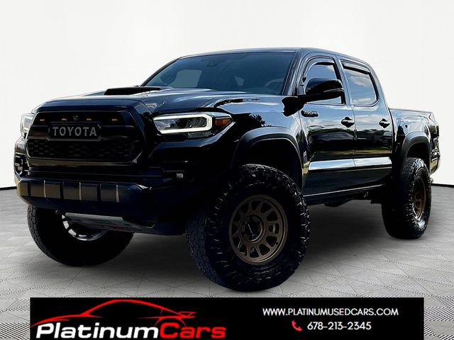Midnight Black Metallic 2021 Toyota Tacoma Pickup Truck Four-Wheel Drive 6-Speed Automatic