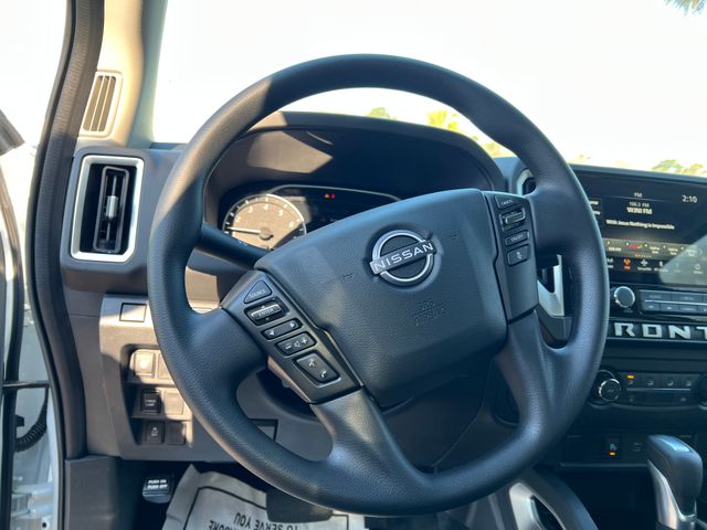 2025 Glacier White Nissan Frontier SV RWD Truck