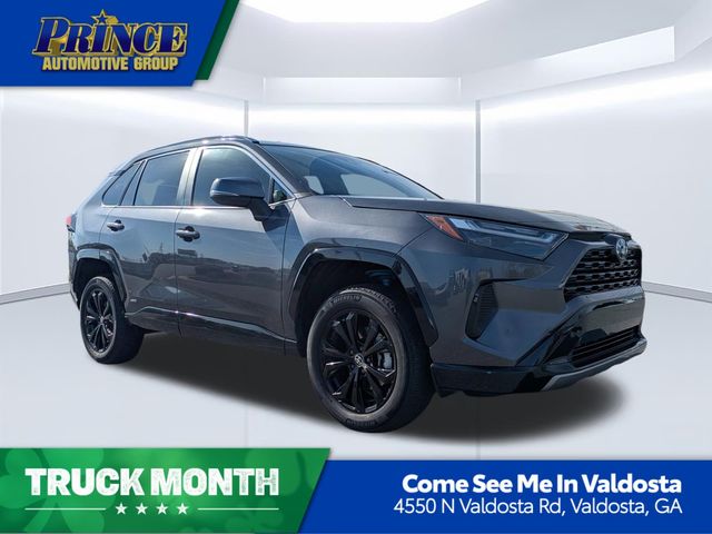 Magnetic Gray Metallic/Midnight Black Metallic 2023 Toyota RAV4 Hybrid SE AWD SUV / Crossover All-Wheel Drive Continuously Variable Transmission