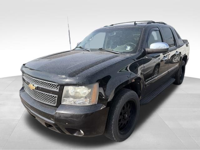 Black 2009 Chevrolet Avalanche Pickup Truck Four-Wheel Drive 6-Speed Automatic